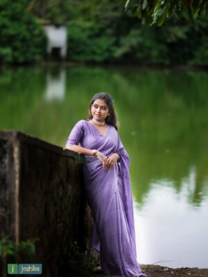 SELF EMBROIDERED SILKY SAREE WITH UNSTITCHED BLOUSE MATERIAL