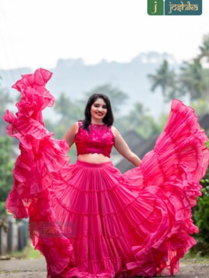 JOYFUL SPIN IN A VIBRANT PINK RUFFLED LEHENGA