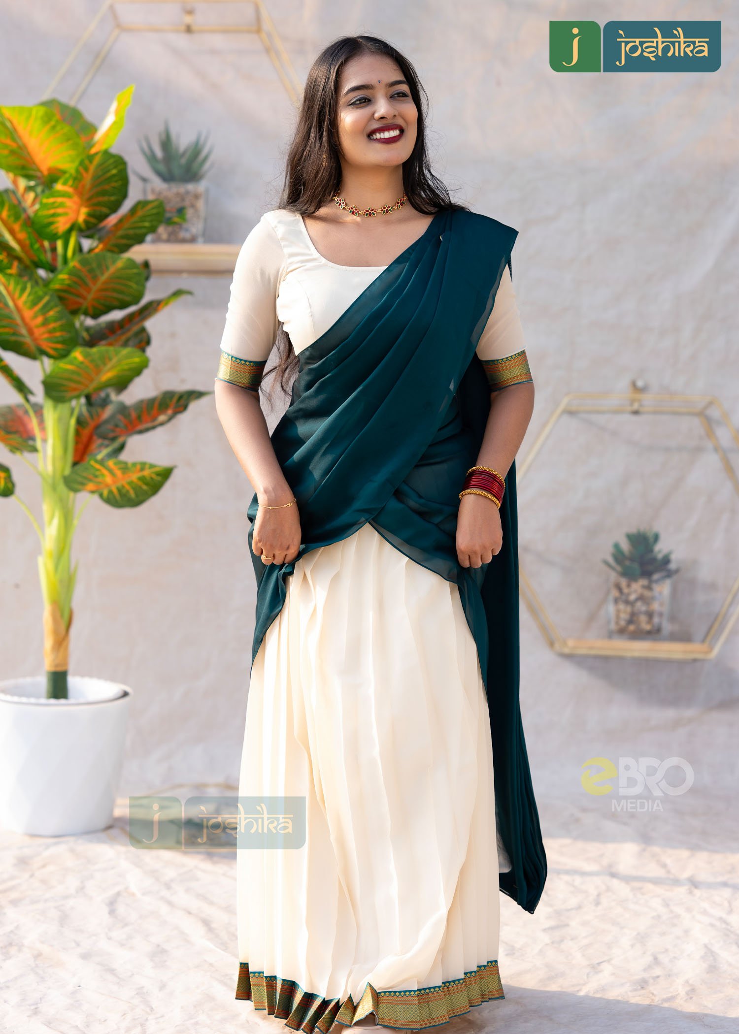 ELEGANT HERITAGE DAVANI SET IN CREAM AND PEACOCK GREEN